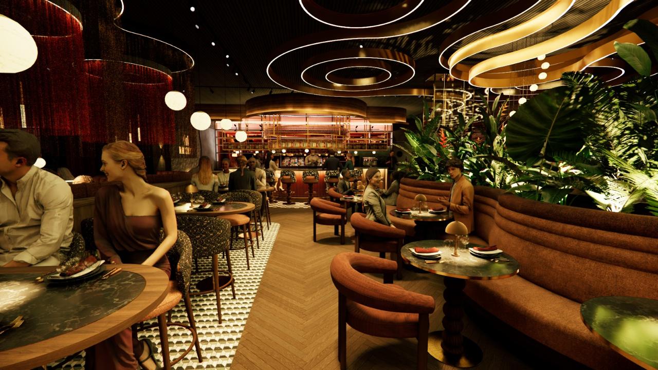 Lounge detail — layered lighting over low tables and curved furniture.